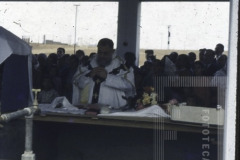 Padre em Missa